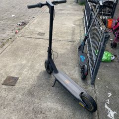 2 scooters one ninebot one motus