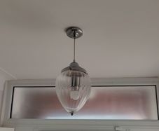 Chrome and glass pendant lights set of two
