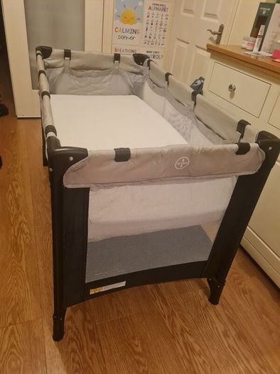 Full size Travel cot with mattress and bedding