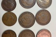 6 UK one pence and 3 UK half pence