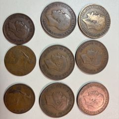 6 UK one pence and 3 UK half pence