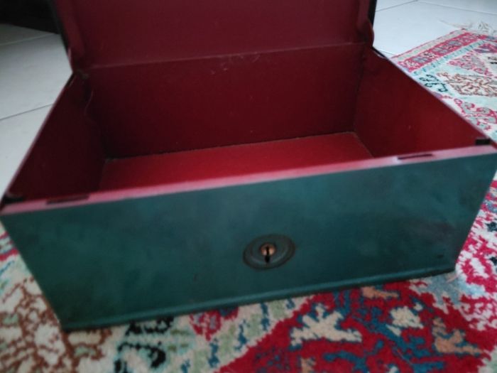 Vintage green metal cash box with key