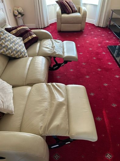 3 seater leather couch and one chair , recliners