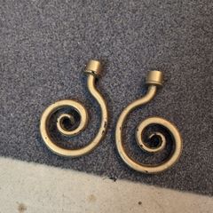 Distressed antique gold curtain finials