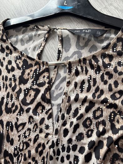 ladies top  shiny design all through it