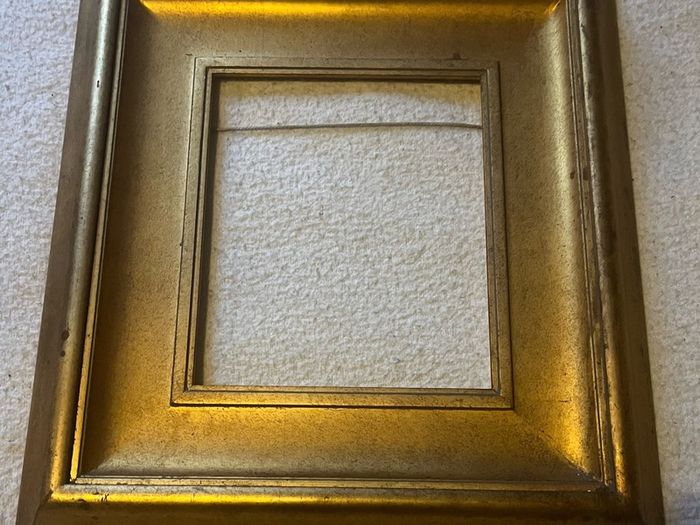 frame This is a modern, deep-profile gilt wood picture frame with a slip / inner liner profile.