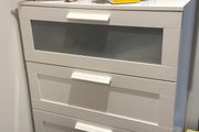 White 4-drawer chest with frosted glass top drawer
