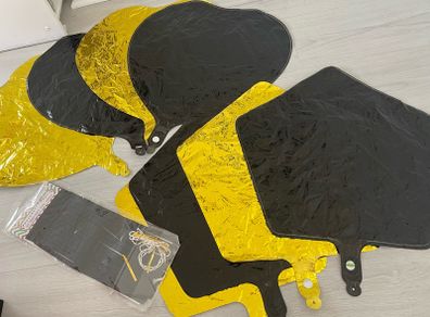 Black and gold party decoration foil balloons and garland