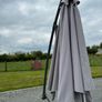Large parasol and two weights. Bought for 170 last summer. Selling due to getting a pergola installed Image 4