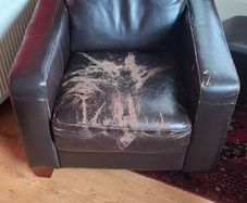 Leatherette arm chair (Brown).