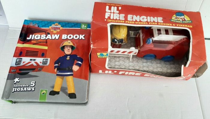 Vintage fire engine with play people and fireman Sam jigsaws