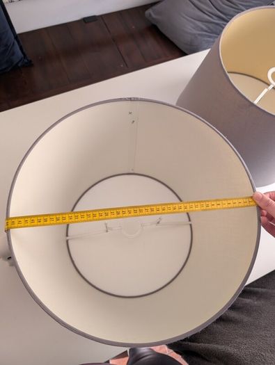 2 large grey lampshades