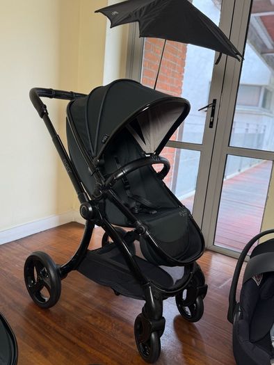 As New Egg2 travel system with Cybex car seat and isofix base swivel