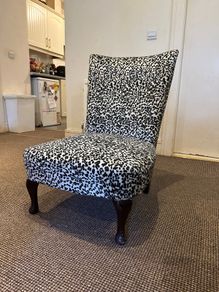 Leopard print upholstered chair
