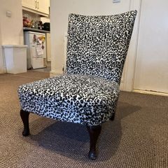 Leopard print upholstered chair