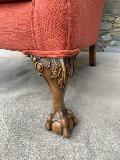 A pair of Chippendale Revival Country House wingback armchairs on Ball & Claw feet.