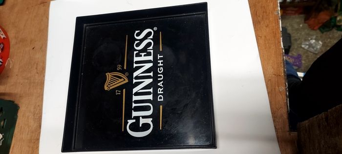 Guinness square drinks tray ,unusual item square ,buyer collects or pays postage, see pictures for condition ,used condition few marks, good solid condition,,sold as is .
