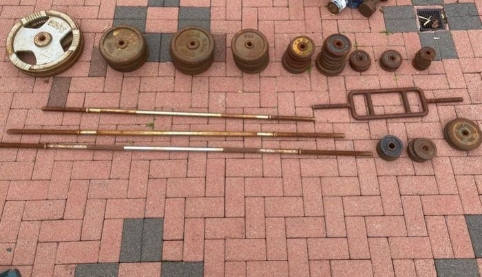 Assorted bars and cast iron weight plates