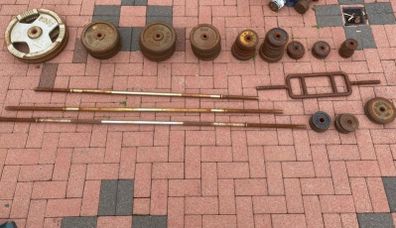 Assorted bars and cast iron weight plates