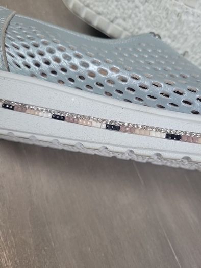 Brand new pair of silvery blue mesh shoes from CINDERS