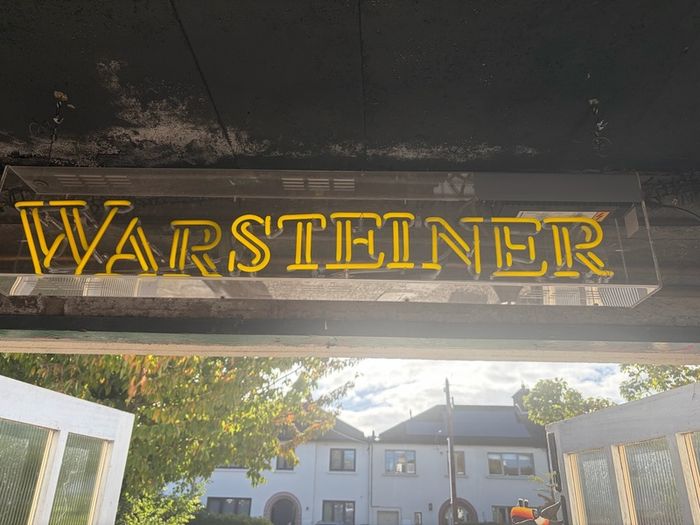 Man cave home bar neon warsteiner beer sign