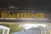 Man cave home bar neon warsteiner beer sign