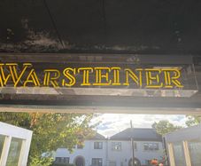 Man cave home bar neon warsteiner beer sign