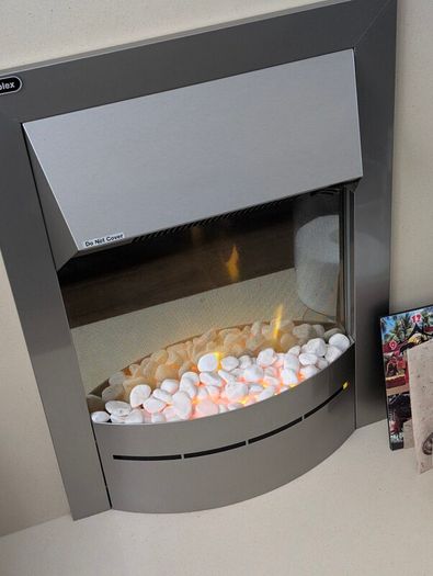 fireplace surround with an electric fan heater