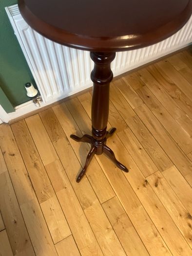 Solid maghoney plant stand. 34in high x 13in diameter