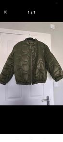 Coat one size fits up to XL NEW never worn