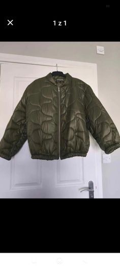 Coat one size fits up to XL NEW never worn