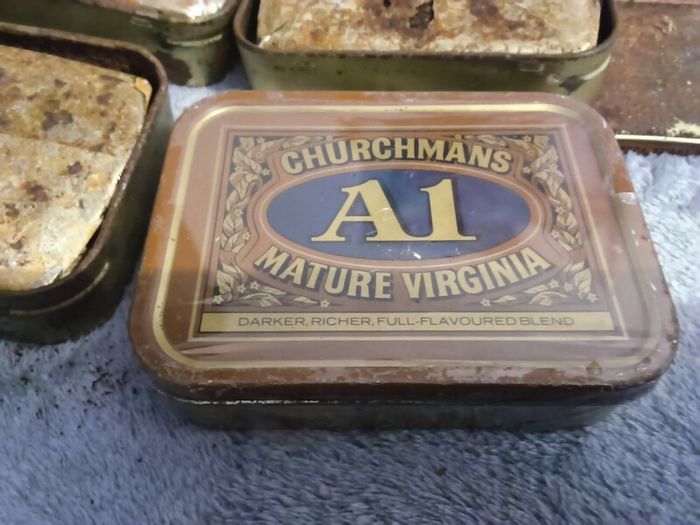 Tobacciana collectable A1tin and contents