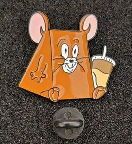 Tom and jerry , pin back badge.