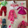 Pre-loved female doll plus clothes Image 3