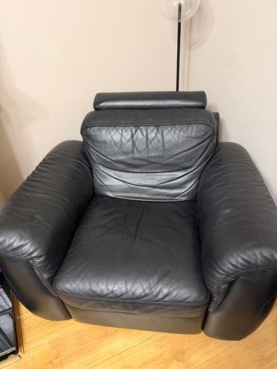 Black leather Natuzzi sofa and two chairs