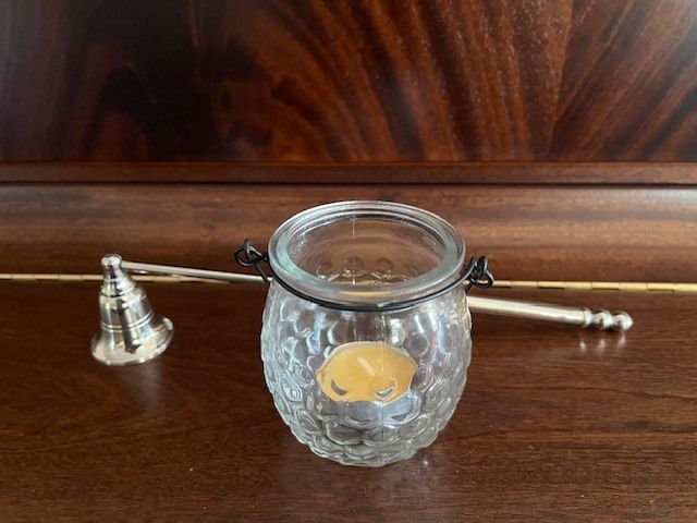 Metal Handle Candle Snuffer. Silver Finish. Moveable Head. With Hanging Tea Light. In Excellent Condition.