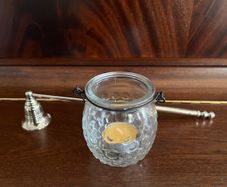 Metal Handle Candle Snuffer. Silver Finish. Moveable Head. With Hanging Tea Light. In Excellent Condition.
