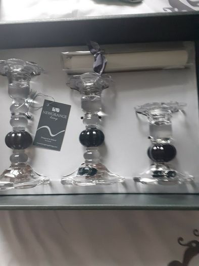 Newgrange candle holders .New in box black and glass .Would make a lovely gift