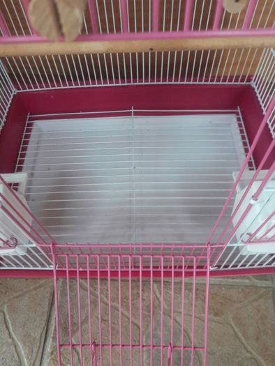 pink bird cage