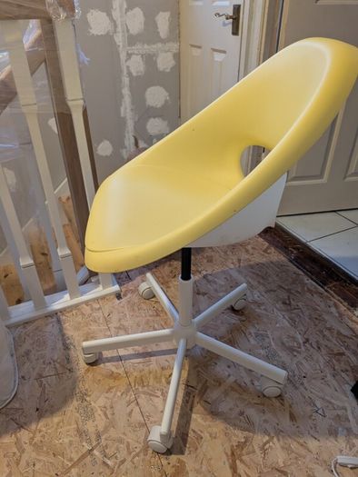 Free ikea yellow swivel chair