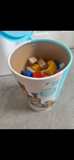 Bucket of wooden building blocks