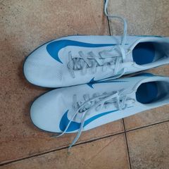 Light blue football astro boots