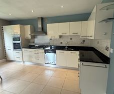 Complete Fitted Kitchen with Neff Appliances and Stone Worktops