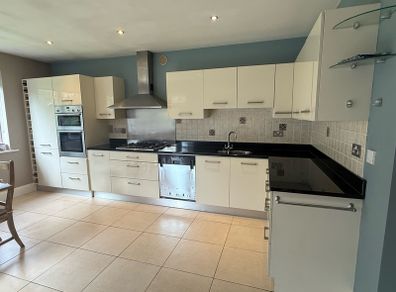 Complete Fitted Kitchen with Neff Appliances and Stone Worktops