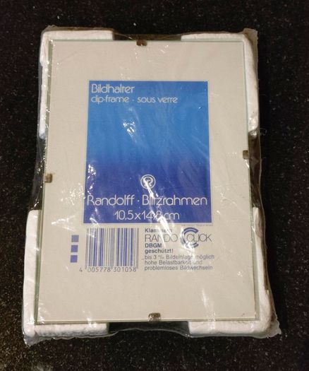 Two Photo Frames (new & Used).
