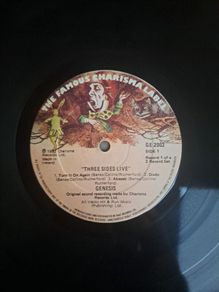 Genesis three sides live . Irish press on The famous Charisma label No sleeve . record 1 of a 2 record set