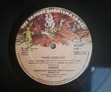 Genesis three sides live . Irish press on The famous Charisma label No sleeve . record 1 of a 2 record set