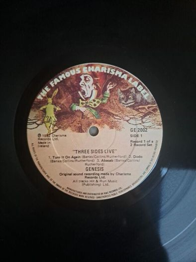 Genesis three sides live . Irish press on The famous Charisma label No sleeve . record 1 of a 2 record set