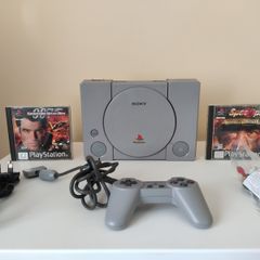 Playstation 1 console SCPH-7502 with games and cords (read description)