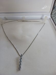 silver chain and pendant